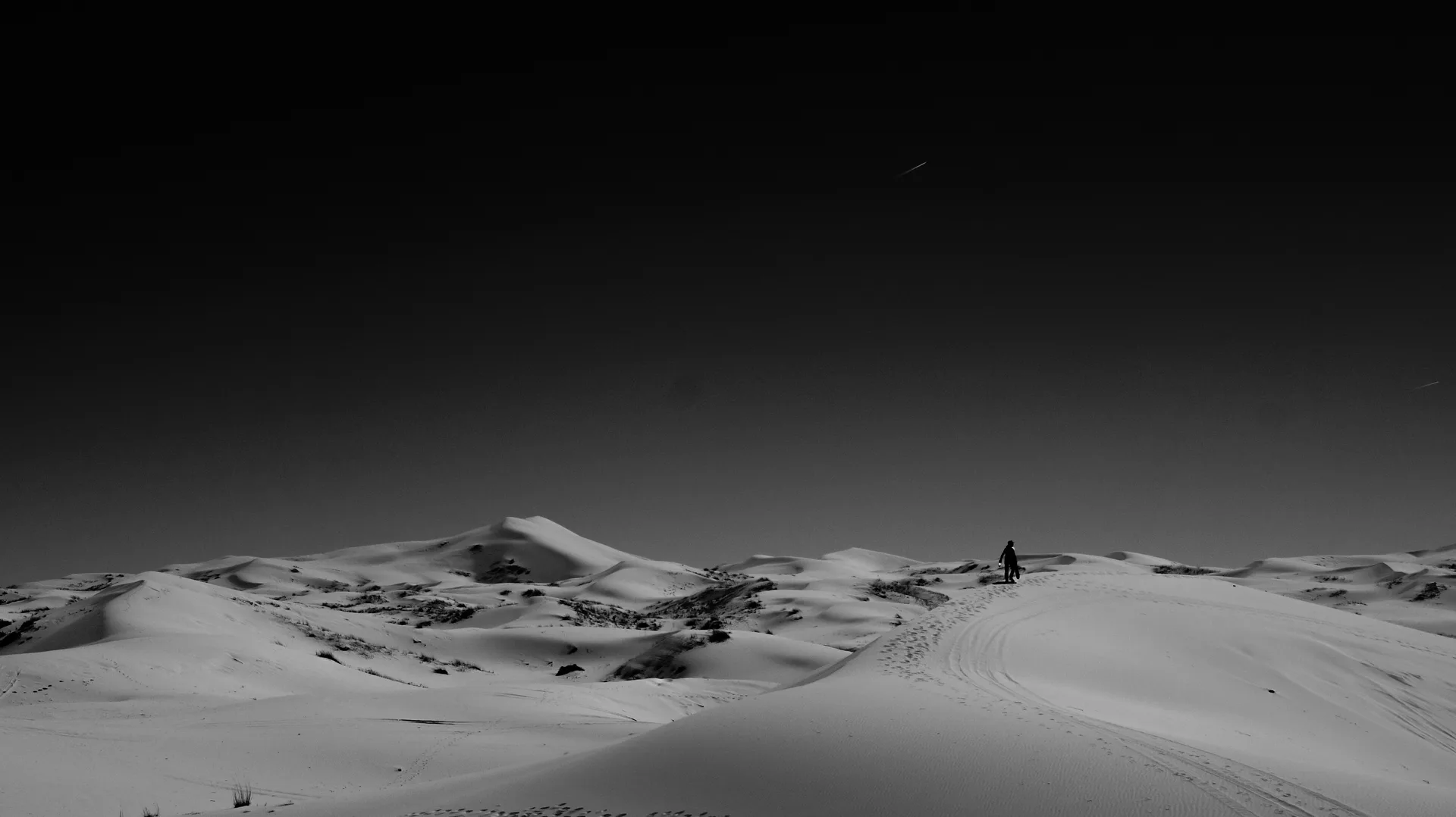 At the top of the smallest dune
