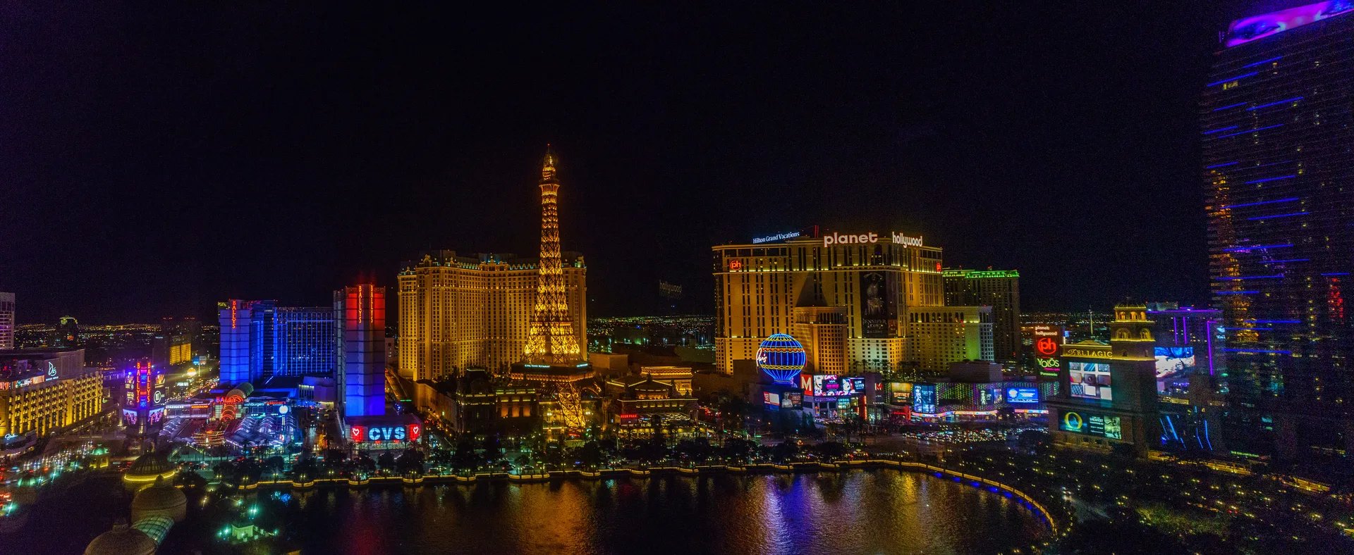The Eiffel Tower Replica Blazes Gold Above a Glowing Nighttime Strip, Paris Las Vegas - 3655 Las Vegas Blvd S - Las Vegas